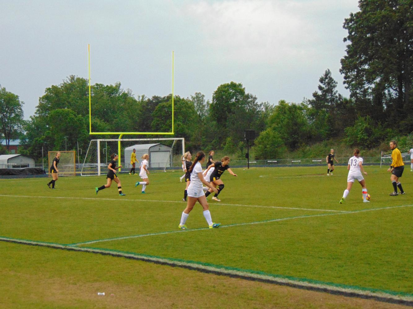 The varsity offense fights towards the goal in their game on Thursday, May 4. They played against Reynolds.