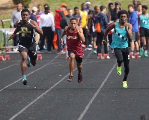 Sprint athlete Malik Miles runs in the 100 meter dash. Reagans track team competed at  the Marvin Ridge Classic.