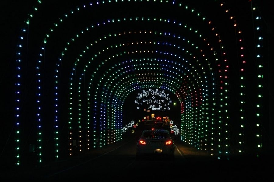 Lights wishes drivers a Merry Christmas to all as they exit the Festival of Lights at Tanglewood Park