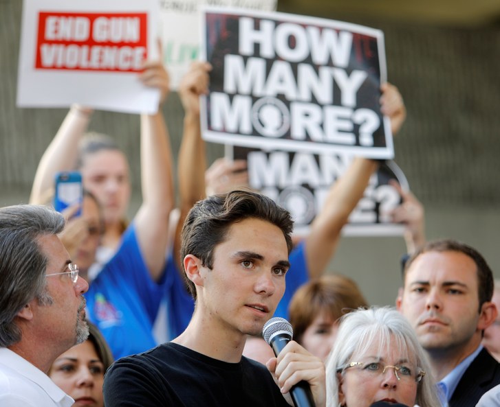 David Hogg, Marjory Stoneman Douglas High School shooting survivor, addresses a crowd. He has been a major player in the fight to reach a gun control agreement.