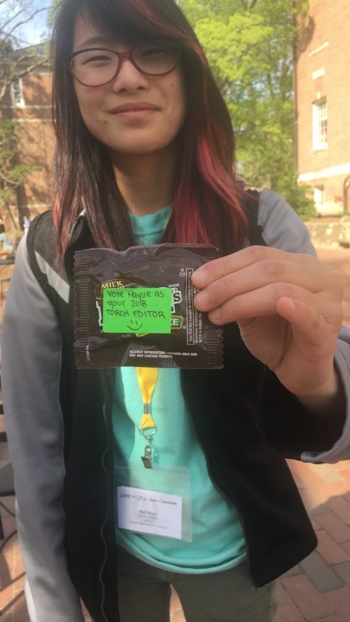 Junior Mari Kilgus holds campaign candy at the NC Latin Convention in UNC Chapel Hill. The event was held April 13-14. 