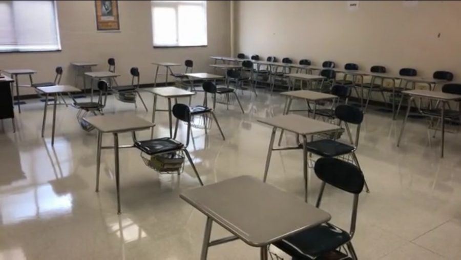 Reagan prepares for in-class social distancing by spacing desks to a safe distance among other methods to ensure a safe return for school. Photo by Brad Royal.