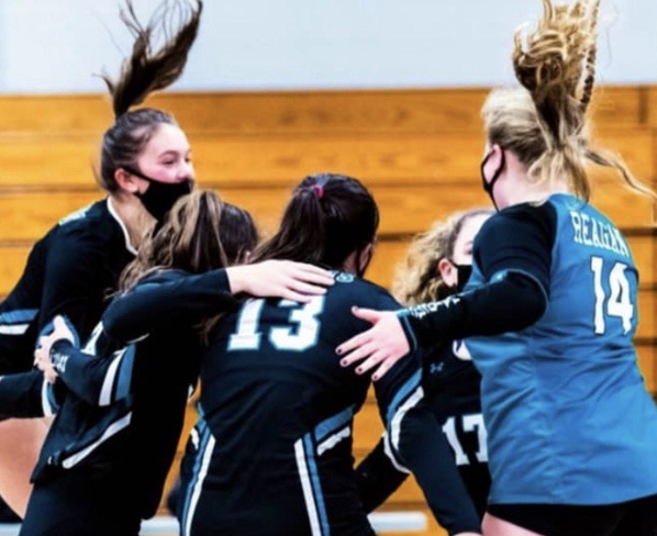 Reagan rallied to score a point. The next game for the Raiders is Dec. 4. Pictured left to right is Jordan Smart (9), Haley Carson (9), Katherine Liontis(12), and Kaci Balser (12).
Photo by Meredith Appanaitis
