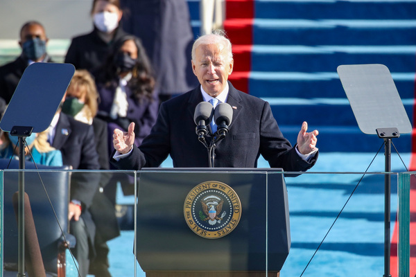 46th President Joe Biden addresses the nation at his inauguration ceremony. Biden was sworn into office by Supreme Court Justice John Roberts before his speech.