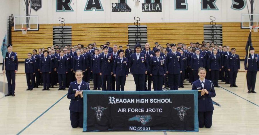 The corps of JROTC stands in formation for a corps picture before going to the Veterans Day parade on Nov. 6. JROTC teaches skills that all students can cooperate into their lives. 