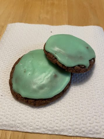 These delicious cookies bring holiday cheer to anyone who makes them. The made from scratch cookies taste similar to an Andes Mint on a soft fudge cookie for both the chocolate and mint lovers in the family.