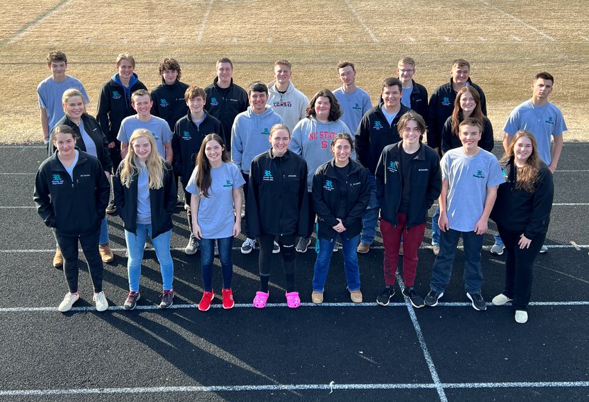 The whole team poses for a team photo at Reagans football stadium on a cool evening in march. The team will travel to Millstone 4-H camp for the state tournament on April 30.