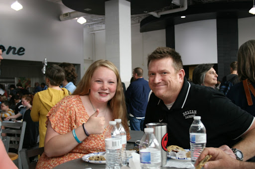 Senior Anna Hauser poses with Scott Pharr, the teacher who nominated her for the Teachers Choice Awards Tea. The Teachers Tea has been a fun Reagan tradition since 2008 and is a family-friendly event.